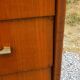 Vintage walnut varnished chest of drawers with 4 drawers from the 1960s.