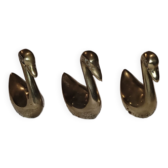 3 brass swans