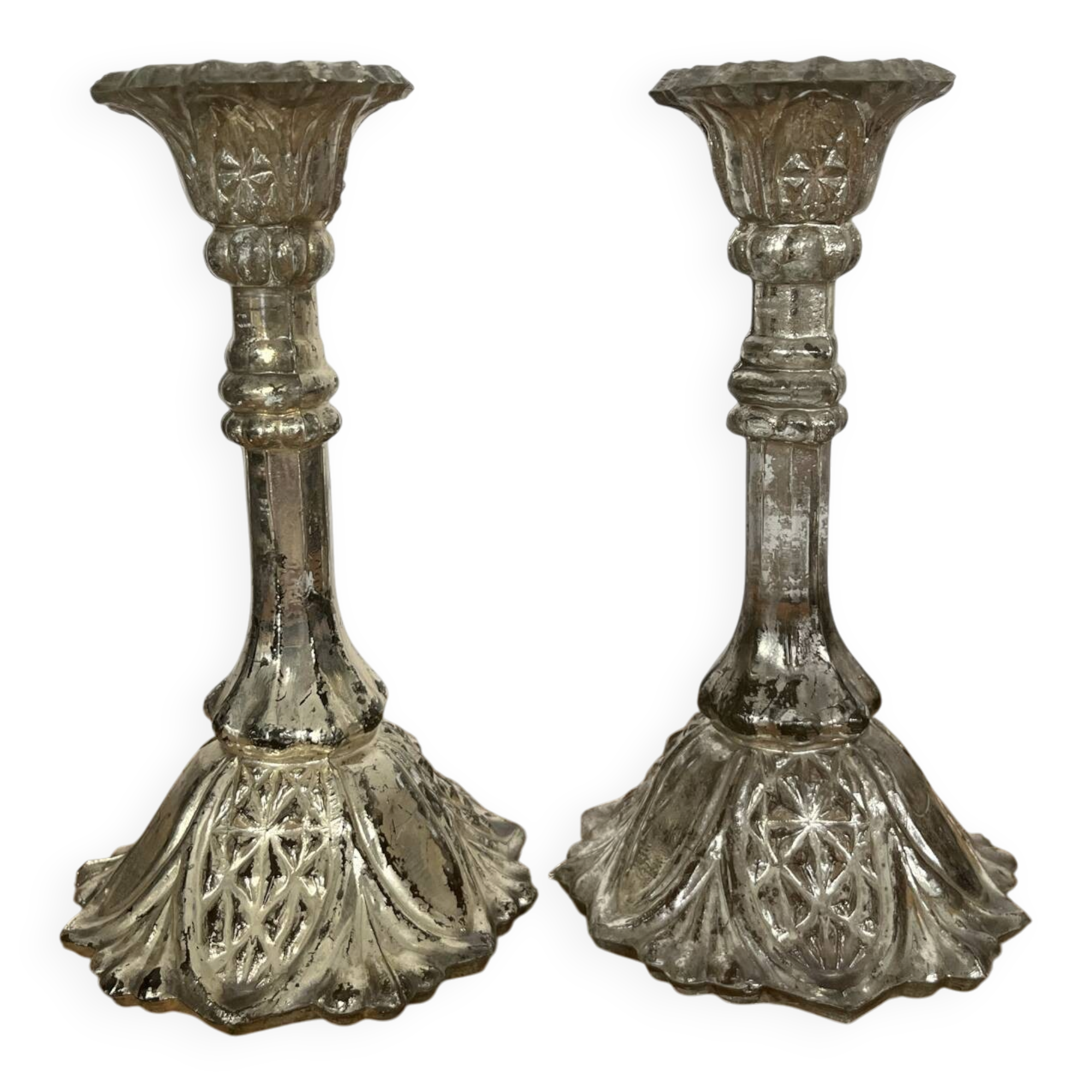 Pair of pressed glass candlesticks with silver plating.
