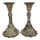 Pair of pressed glass candlesticks with silver plating.