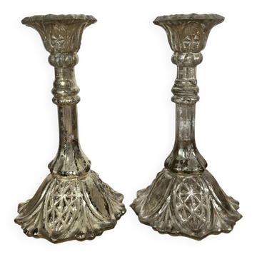 Pair of pressed glass candlesticks with silver plating.