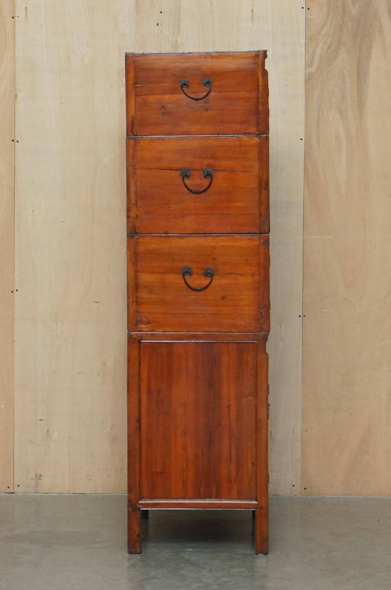Antique Chinese armoire hand-carved around 1880 with country-style handles.