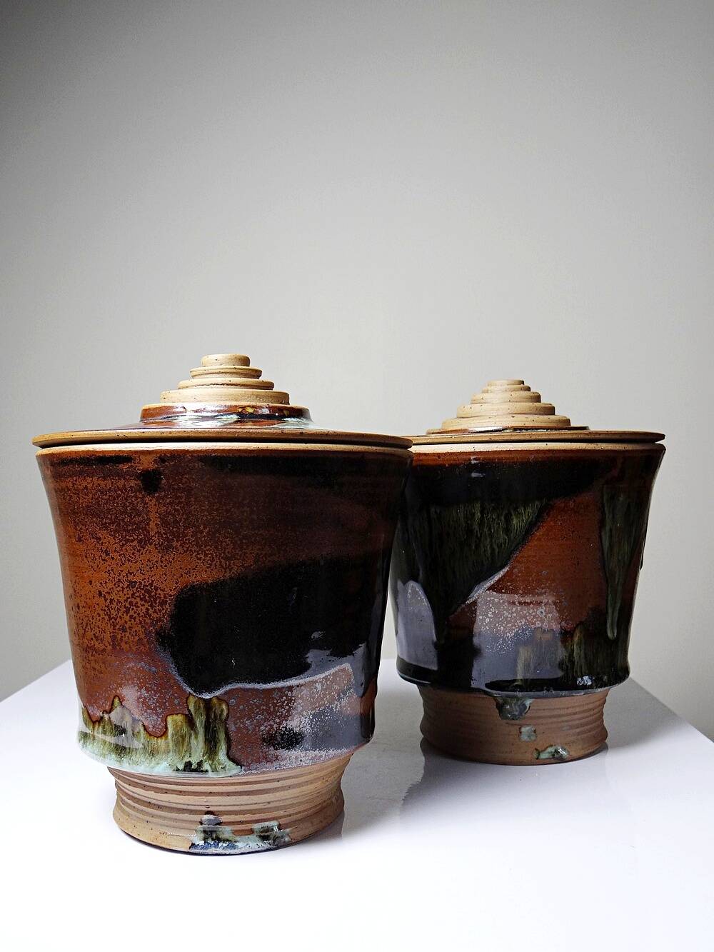 A pair of vintage stoneware pots from the 80s-90s with a Japanese style, signed handmade pottery.