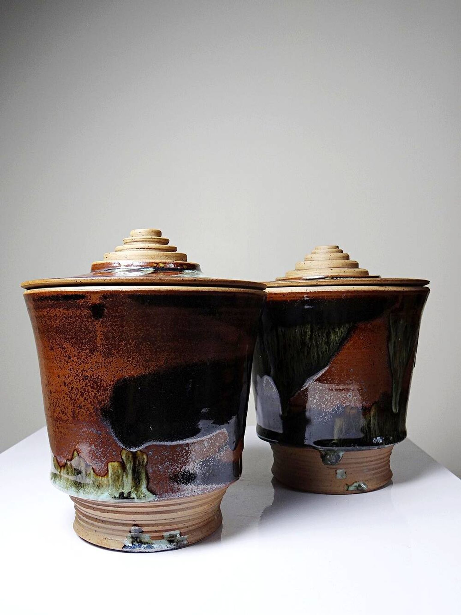 A pair of vintage stoneware pots from the 80s-90s with a Japanese style, signed handmade pottery.