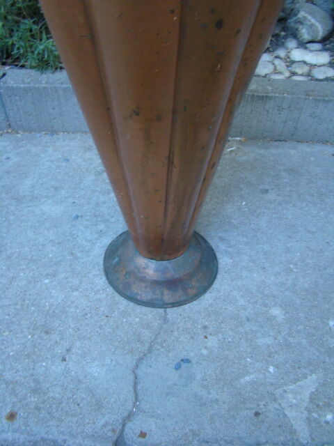 Old copper umbrella holder