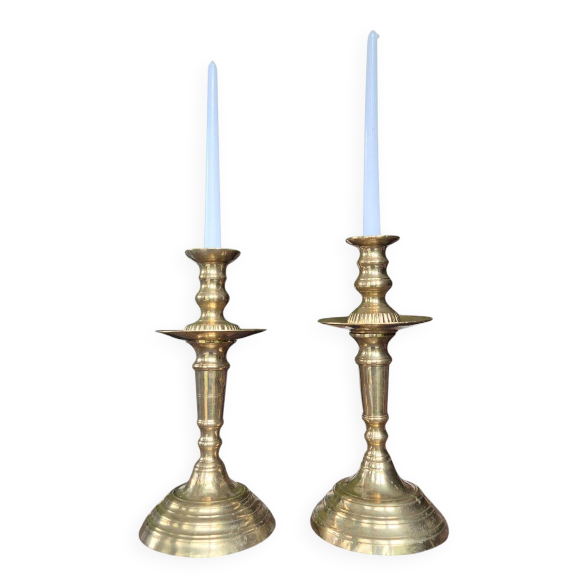 Pair of antique Moroccan brass candlesticks.