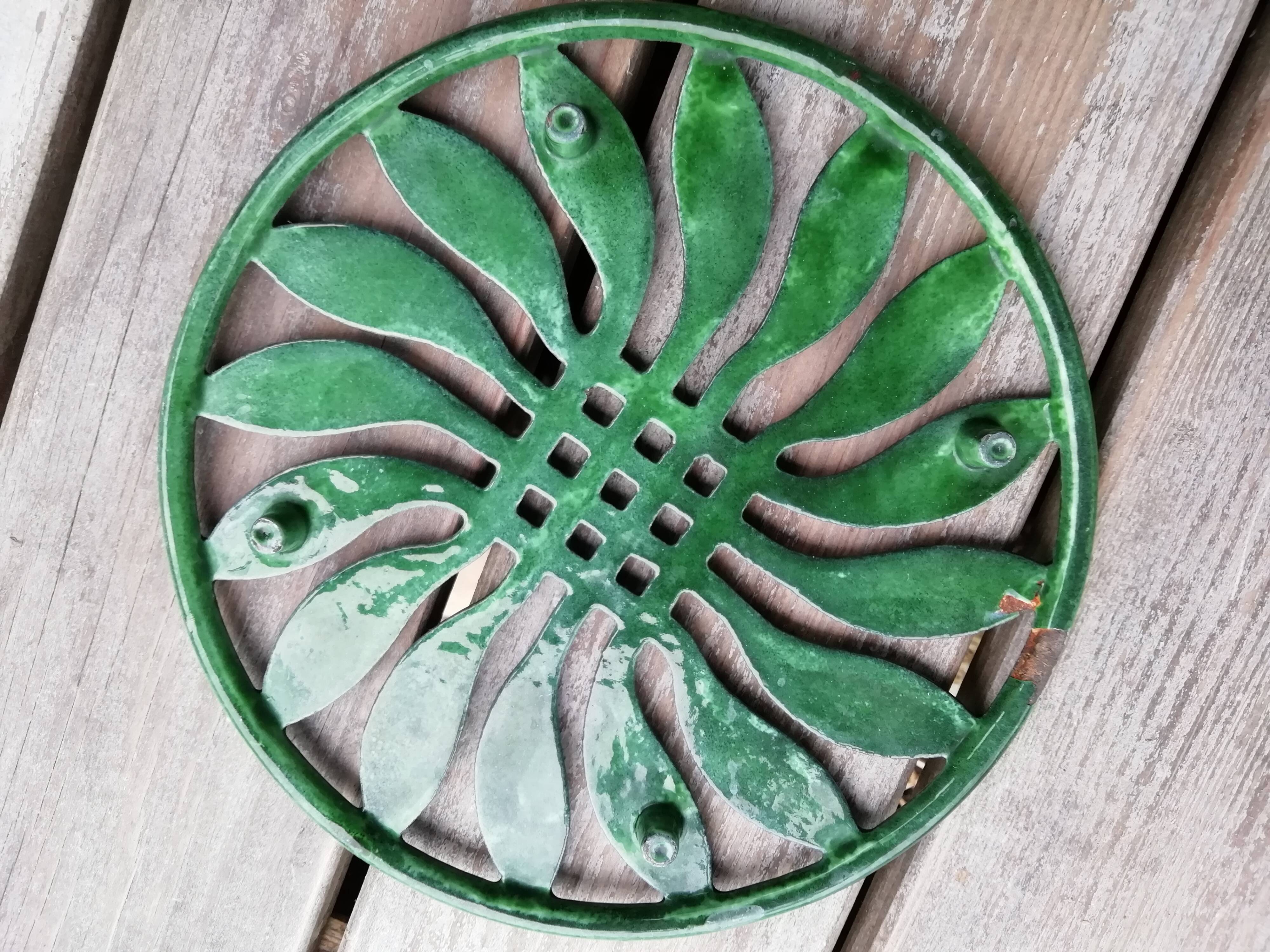 Pair of cast iron table mats