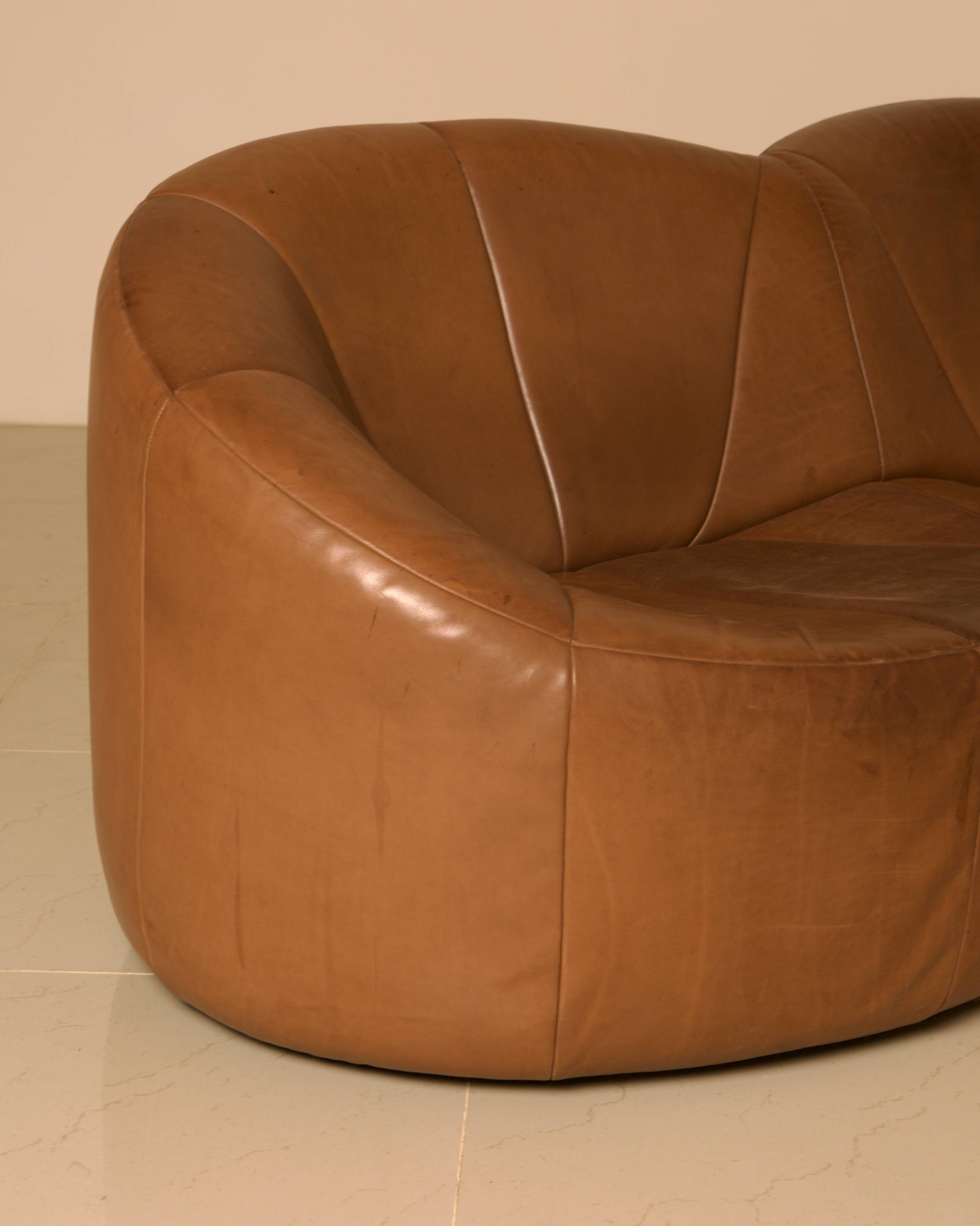 "Pumpkin" 3-seater canapé in patinated brown leather by Pierre Paulin for Arti.