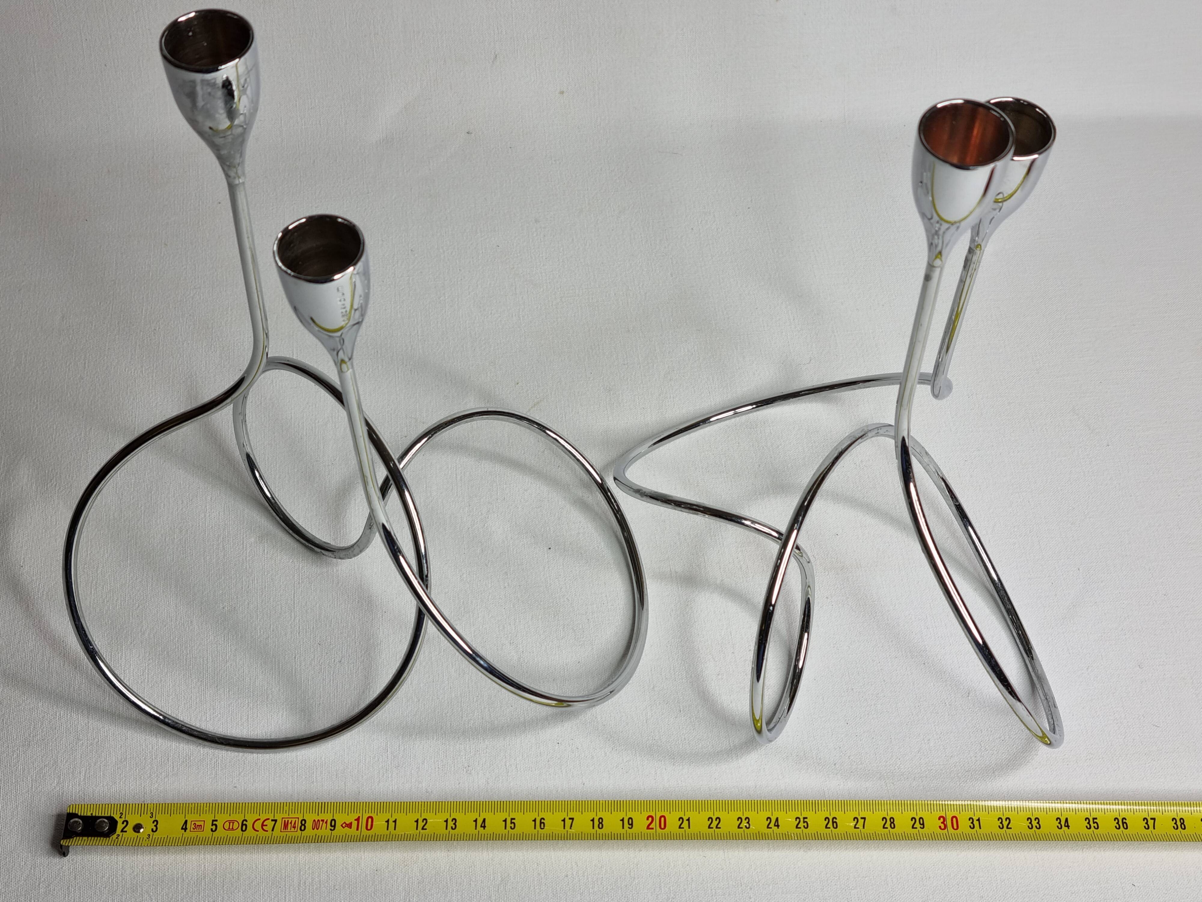Pair of “Black & Blum” designer candlesticks in chrome-plated metal, 27 cm