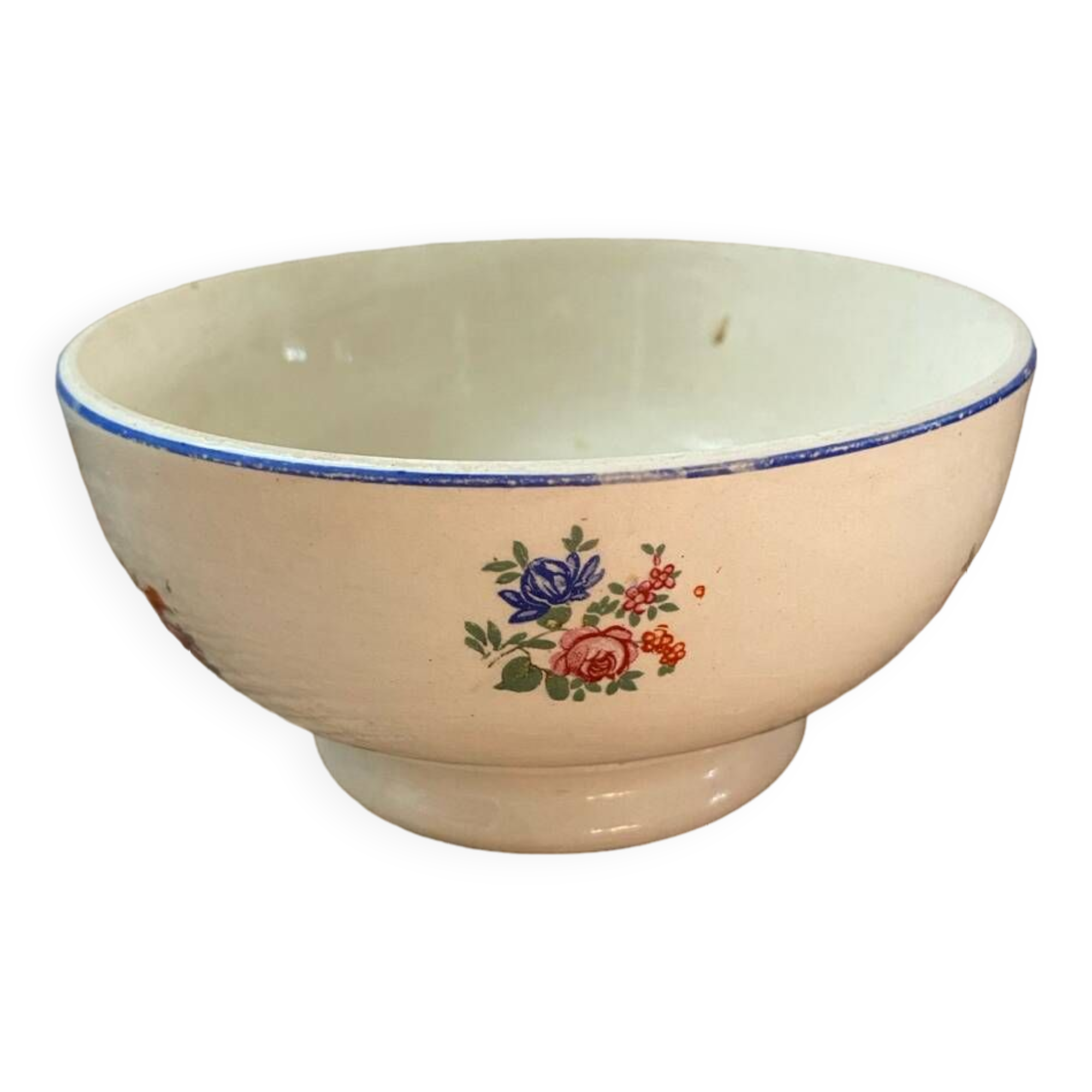 Flowery bowl with blue edging.