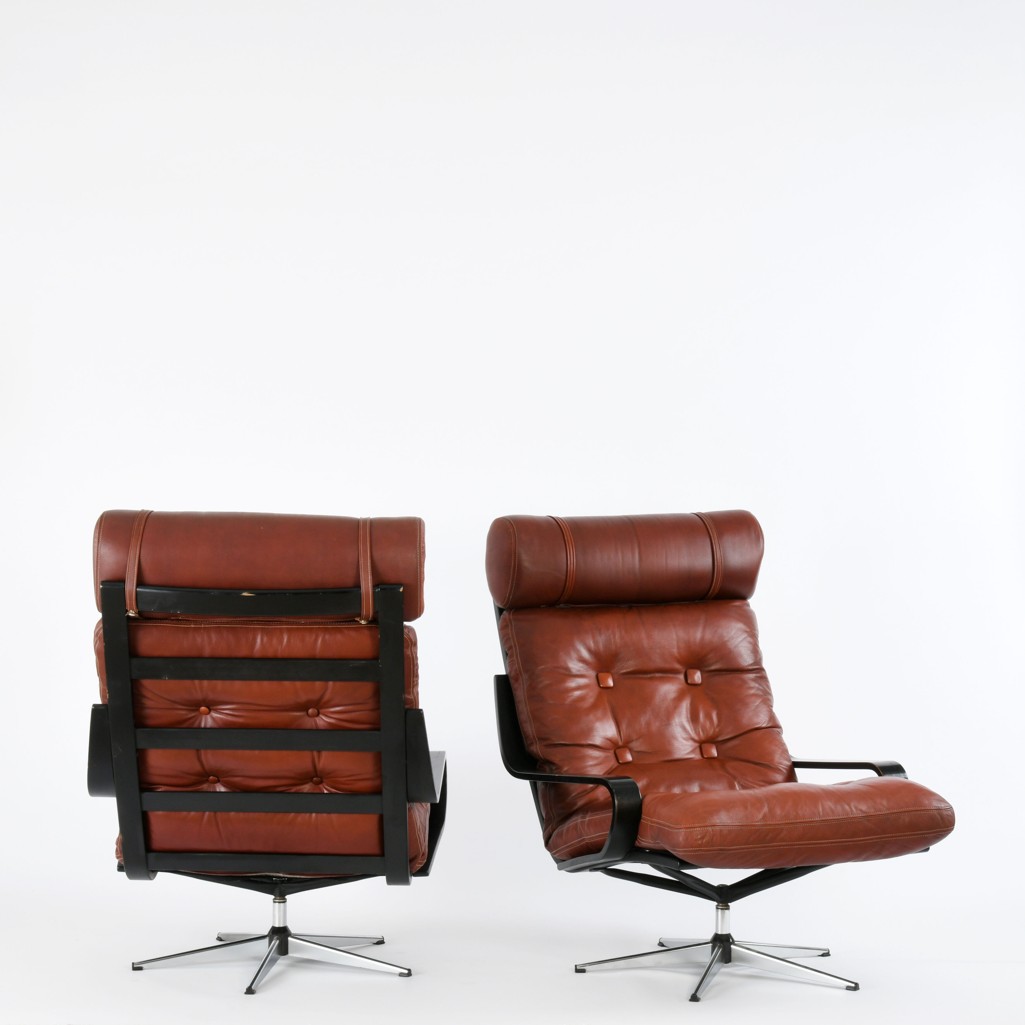 Pair of leather lounge chairs