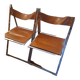 2 Chromed metal and leather folding chairs. 70s. Fontoni & Geraci
