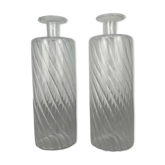 Pair of twisted glass bathroom bottle bottles