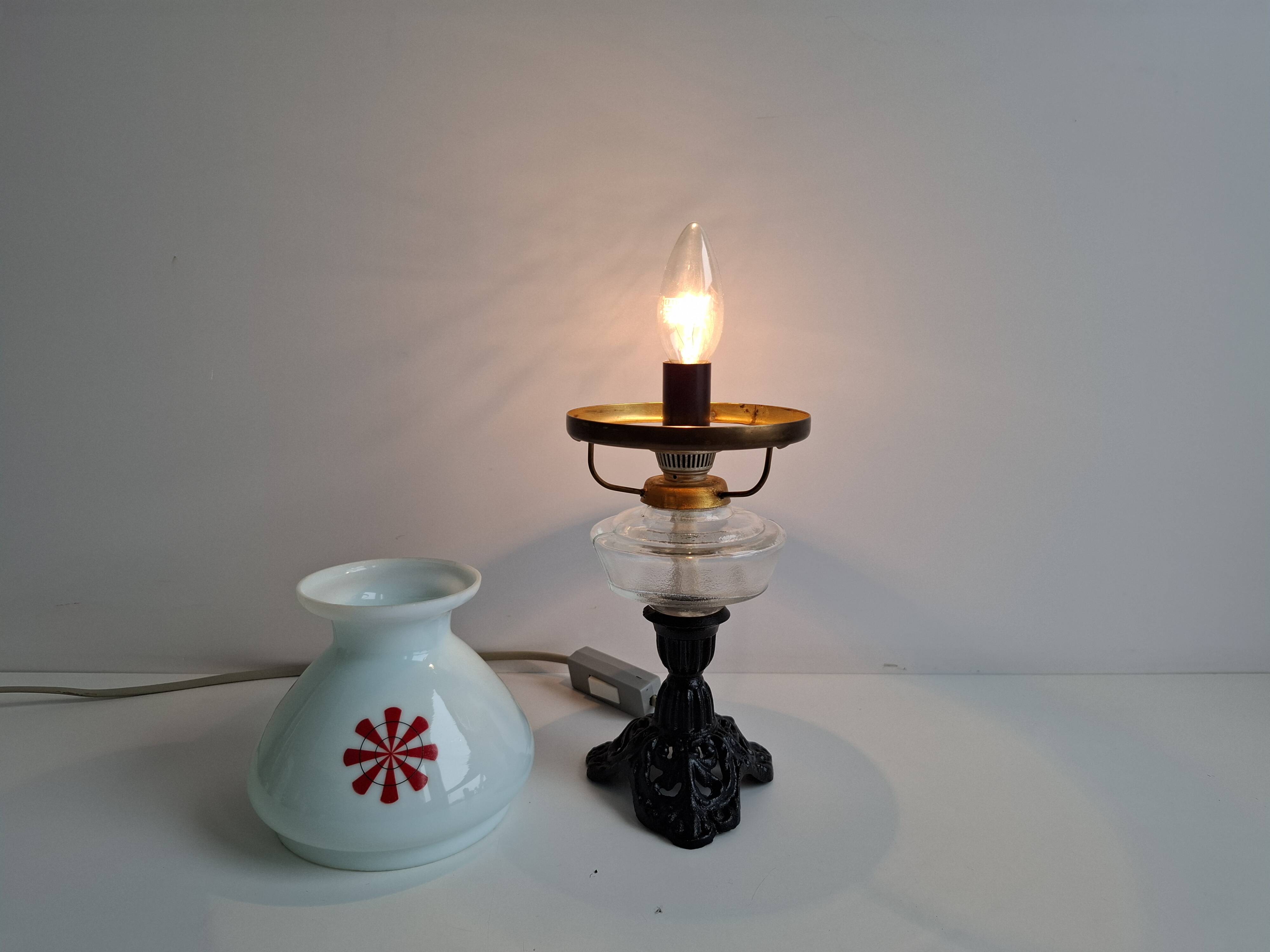 1960s Czechoslovakian milk glass oil lamp style table lamp with red windmill