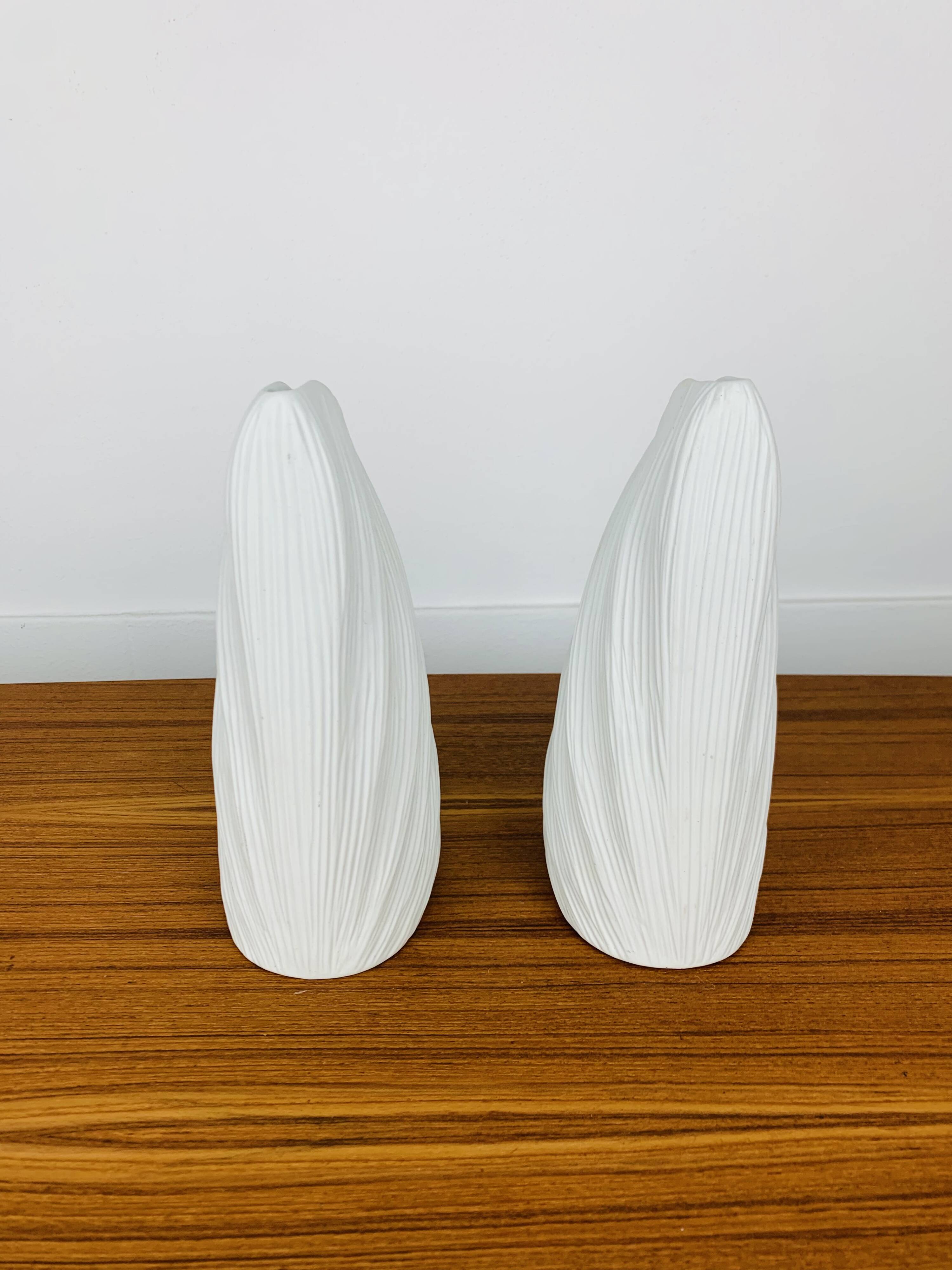 Pair of white ceramic coral vases, bookends