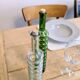 Pair of vintage ribbed blown glass bottles with cork stoppers.