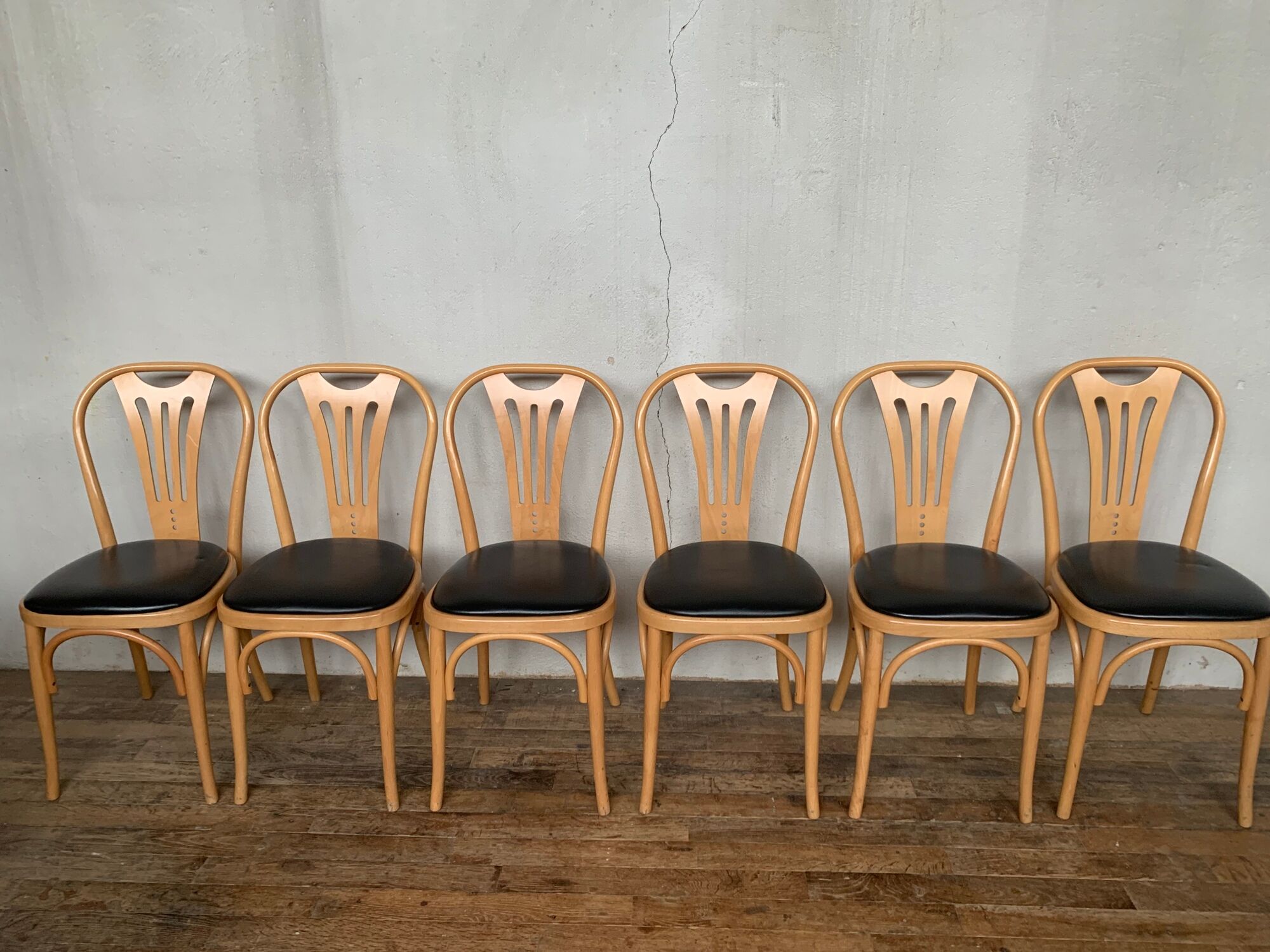Series of 6 bistro chairs in curved wood seated skaï black