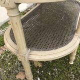 Wooden saddle on three shelves