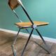 Wooden and caning folding chair "Plia" by G. Piretti for Castelli editions