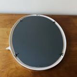 Oval mirror in vintage enameled white cast iron