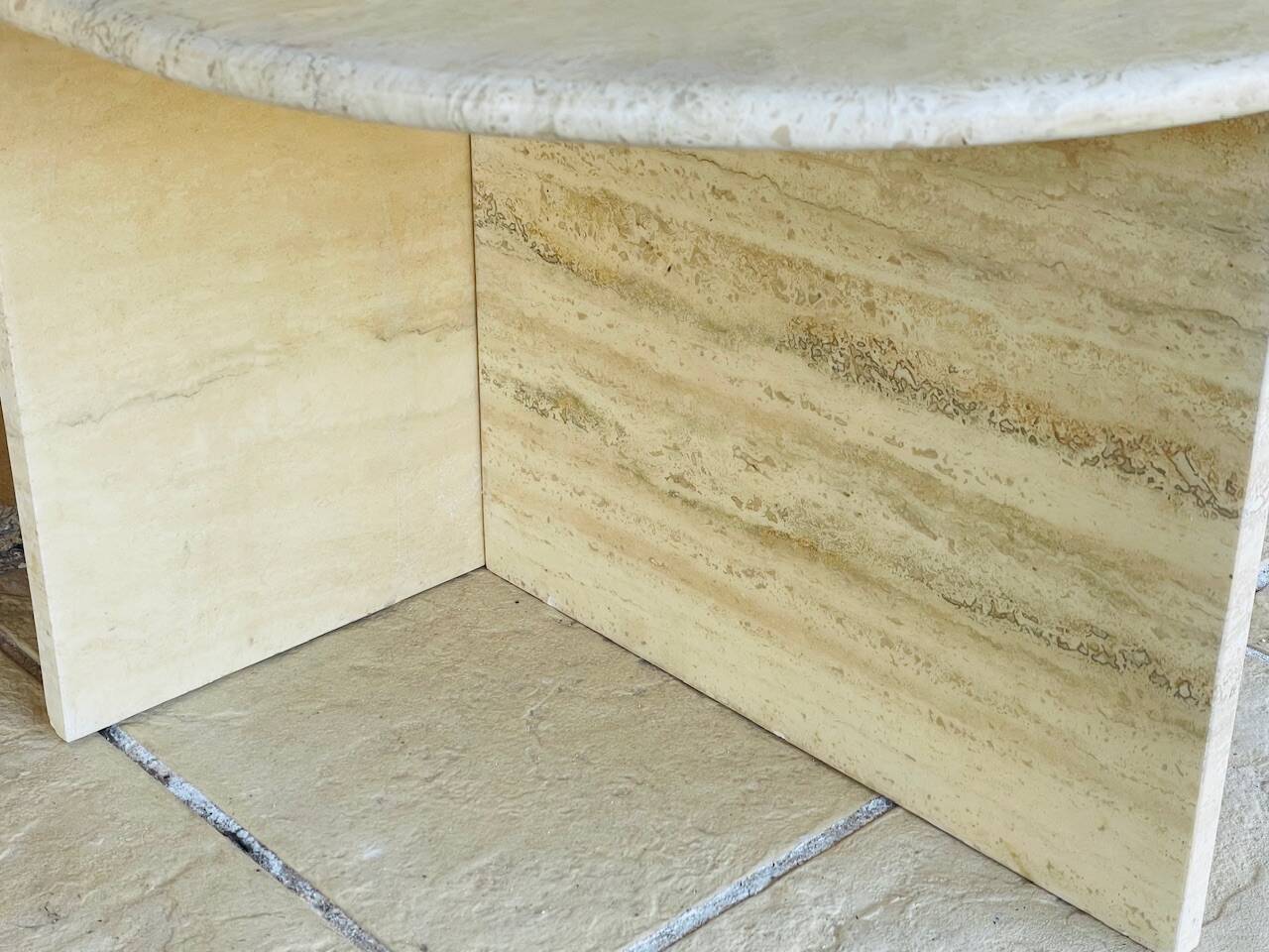 Vintage side table in travertine, circa 1980s.