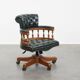 Elegant green English chesterfield office chair made of cowhide leather