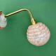Vintage pink Clichy glass globe wall light.