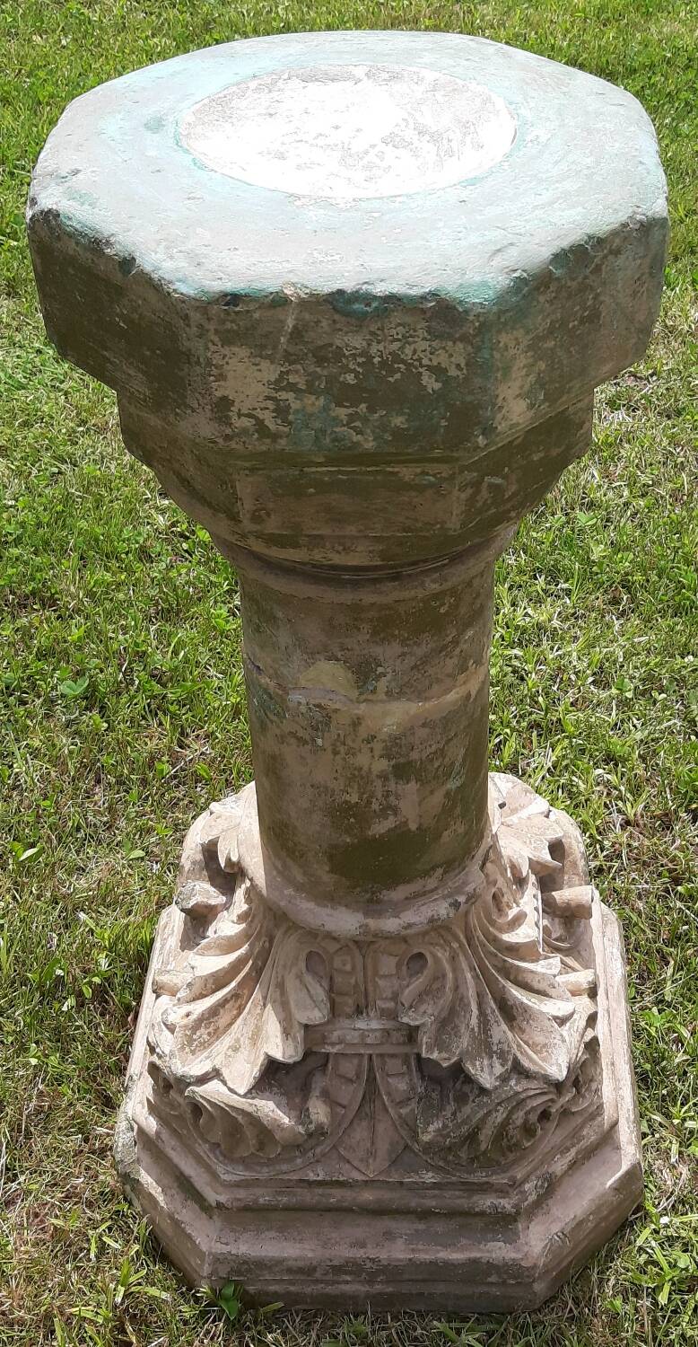 Holy water font on stone column (17th century)