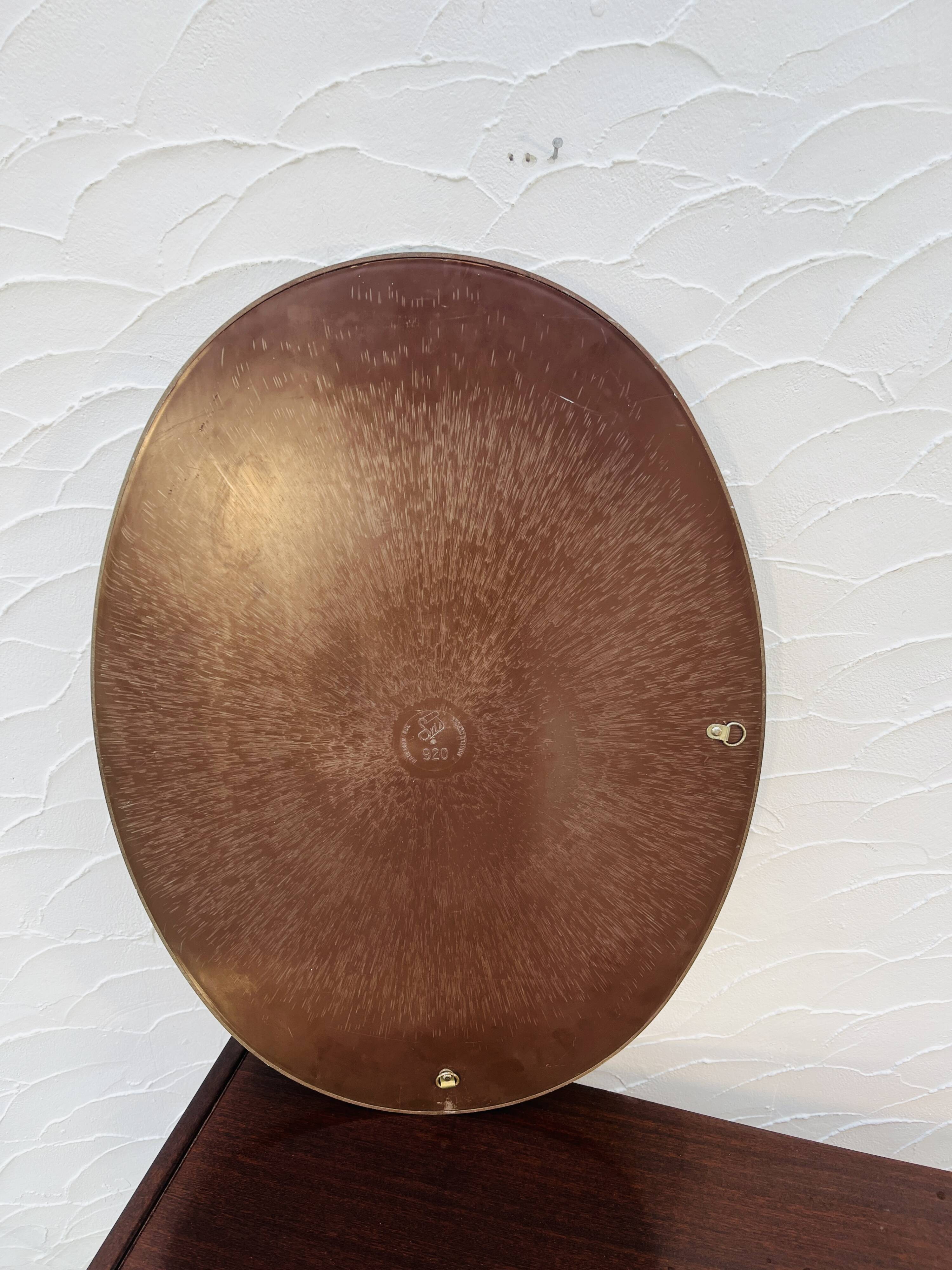 Vintage oval mirror Syla model 920 from the 1970s.