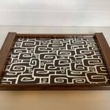 Old wooden tray with psychedelic art deco patterns
