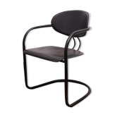 Black armchair with arched legs