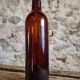 Set of 10 bottles of old Bordeaux French wine in ruby brown glass, 19th century.