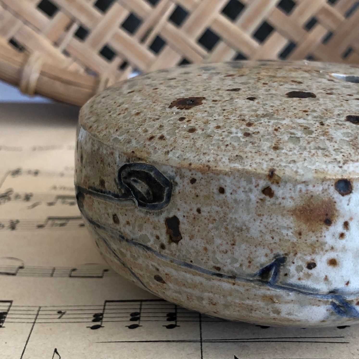 Signed soliflore flower spade in sandstone