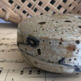 Signed soliflore flower spade in sandstone