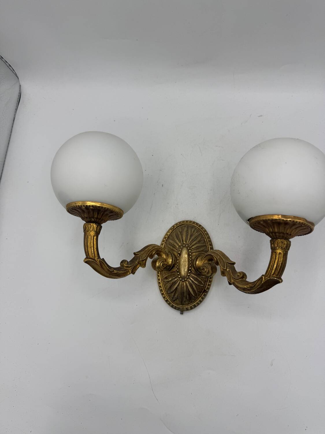 Double gold wall light