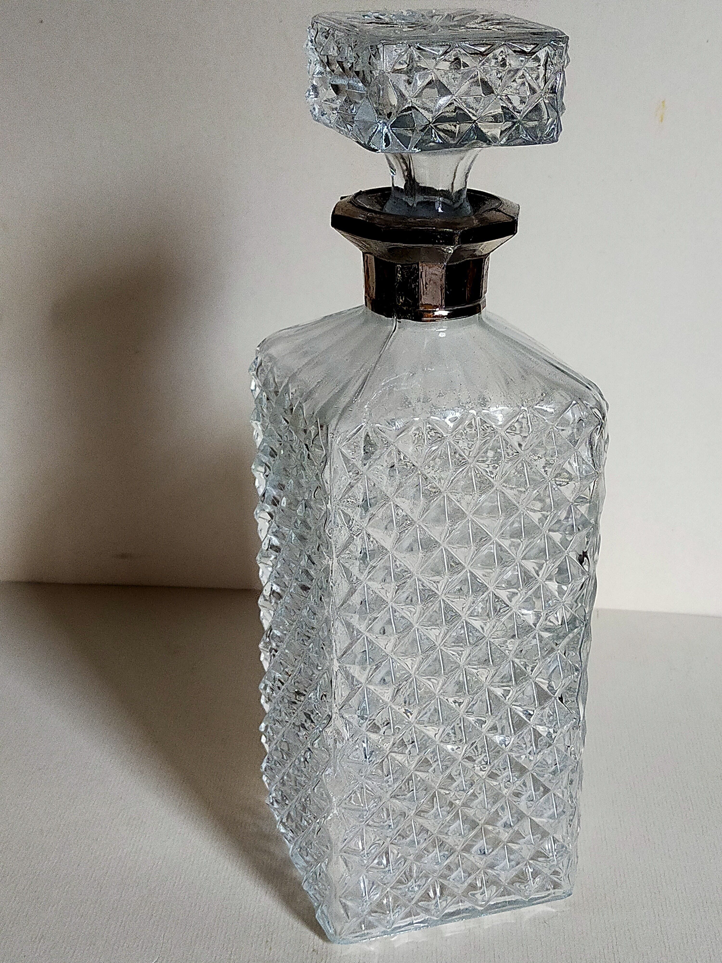 Vintage whisky carafe with golden neck