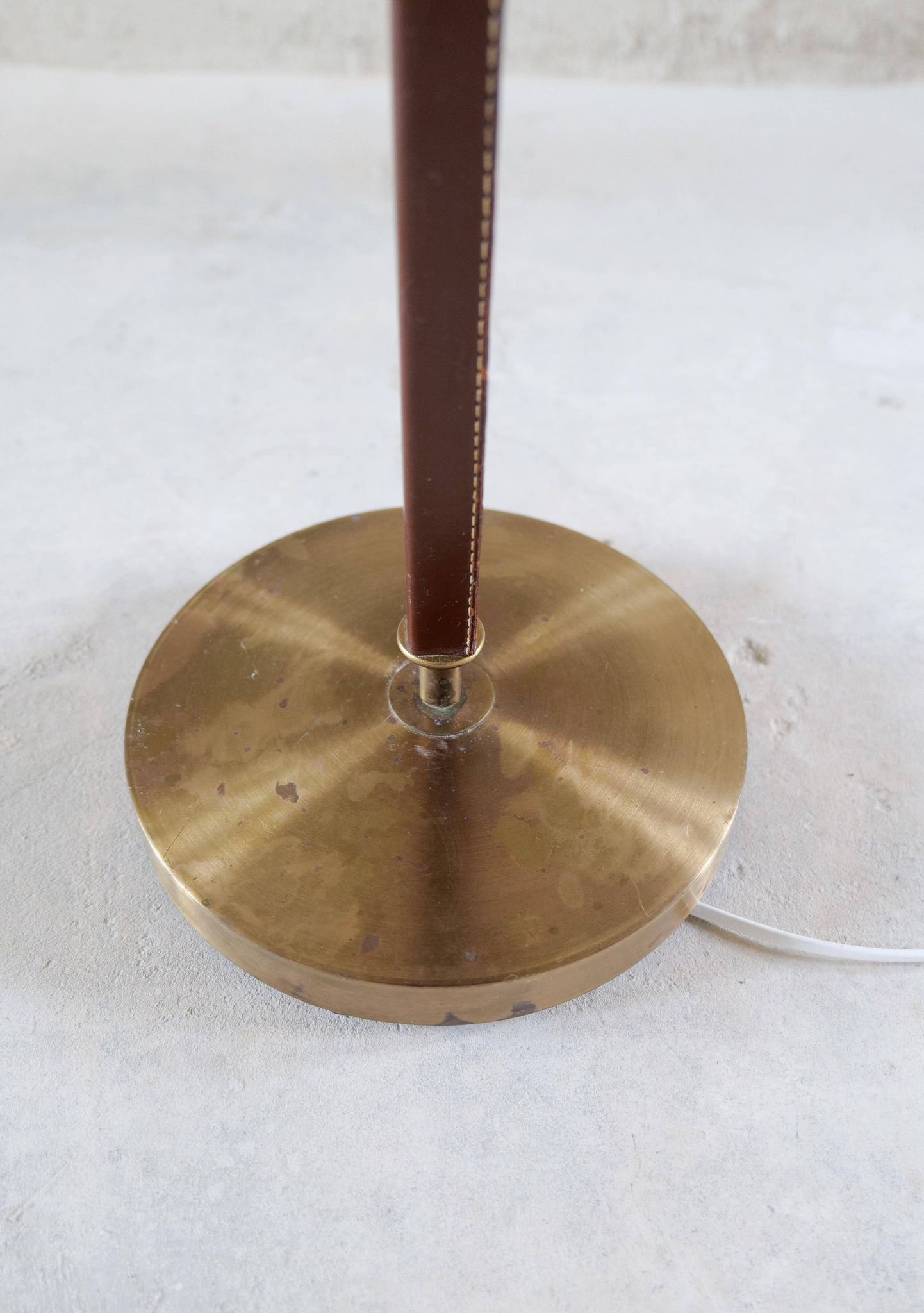 Mid-century brown leather and patinated brass floor lamp by Falkenbergs Belysning, Sweden, 1960s.