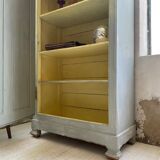 Blue patinated cap cabinet