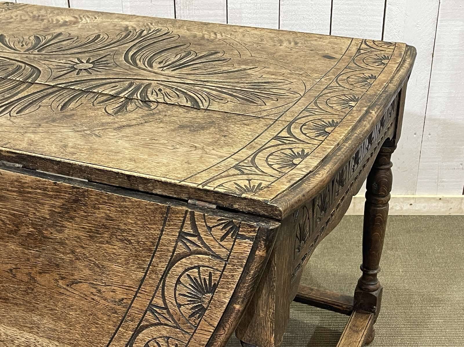 English oak drop-leaf table from the early 20th century