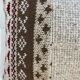 Pair of retro knitted wool cushions