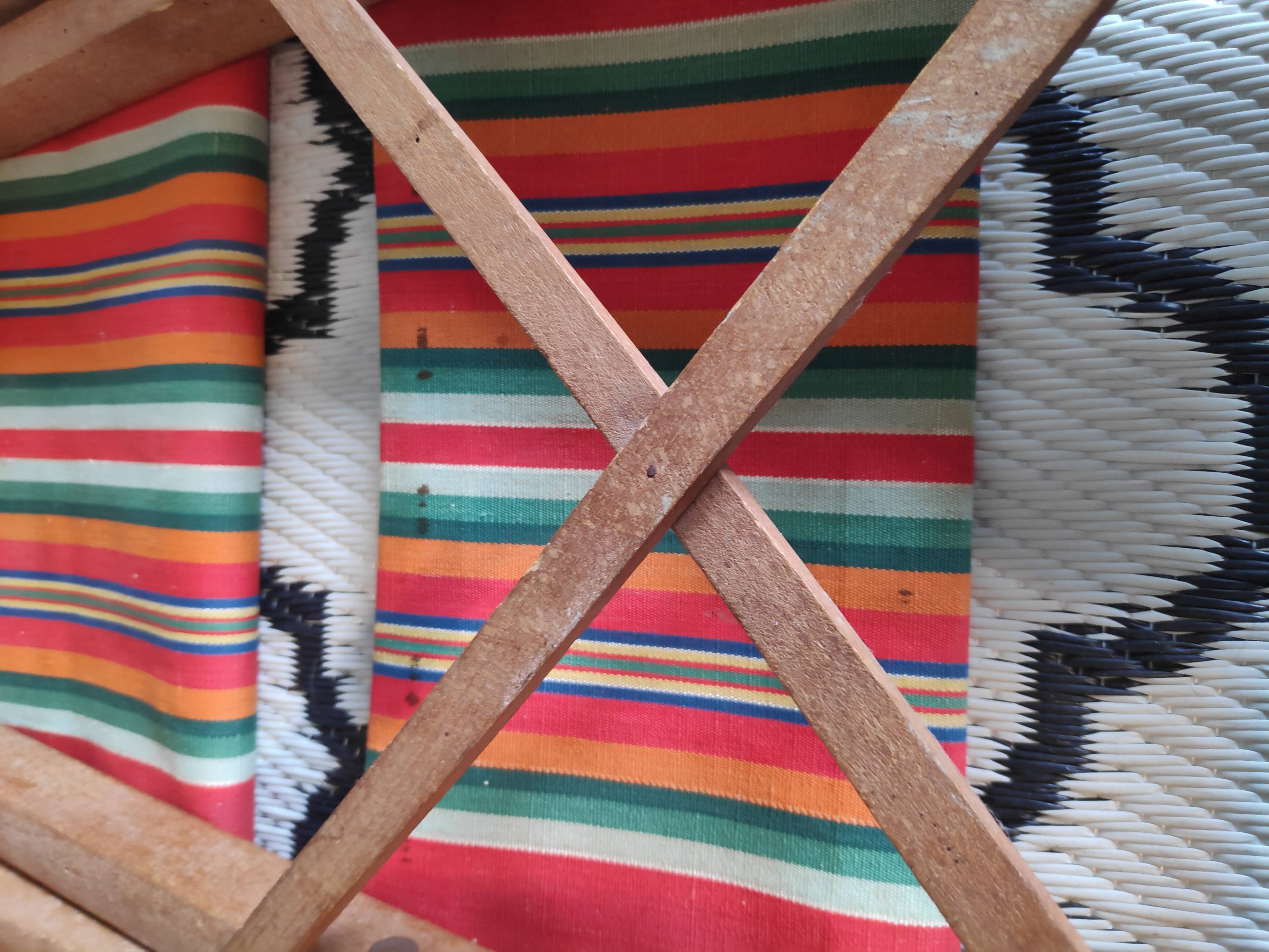 Vintage wooden folding chairs and basque fabric
