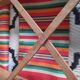 Vintage wooden folding chairs and basque fabric