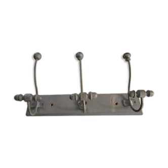 Old coat hangers in wood and metal