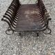 Vintage cast iron fireplace cradle with 16 bars.