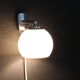 Pair of stainless steel and white glass wall sconces, seventies