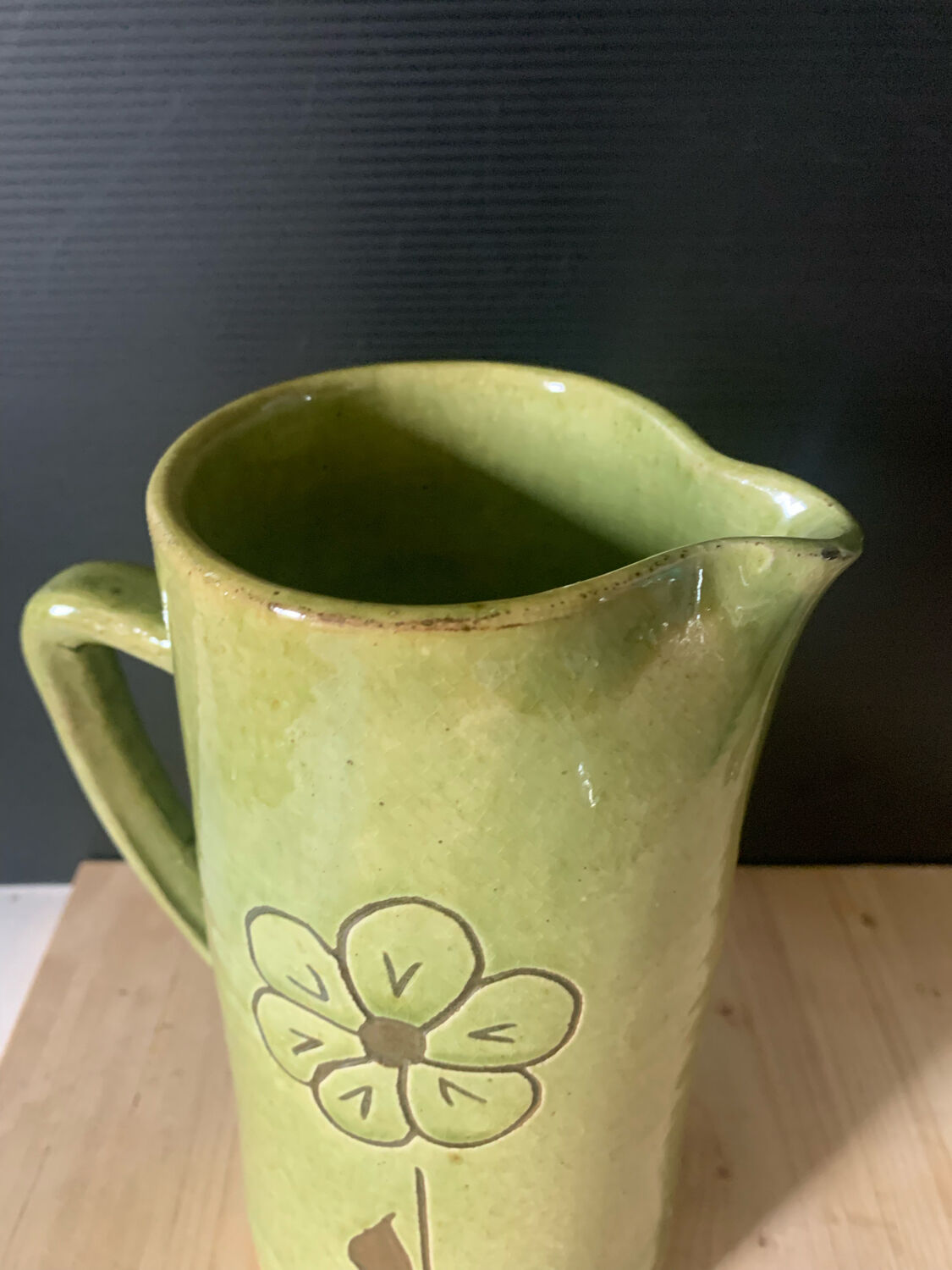 Green ceramic pitcher