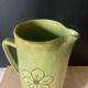 Green ceramic pitcher