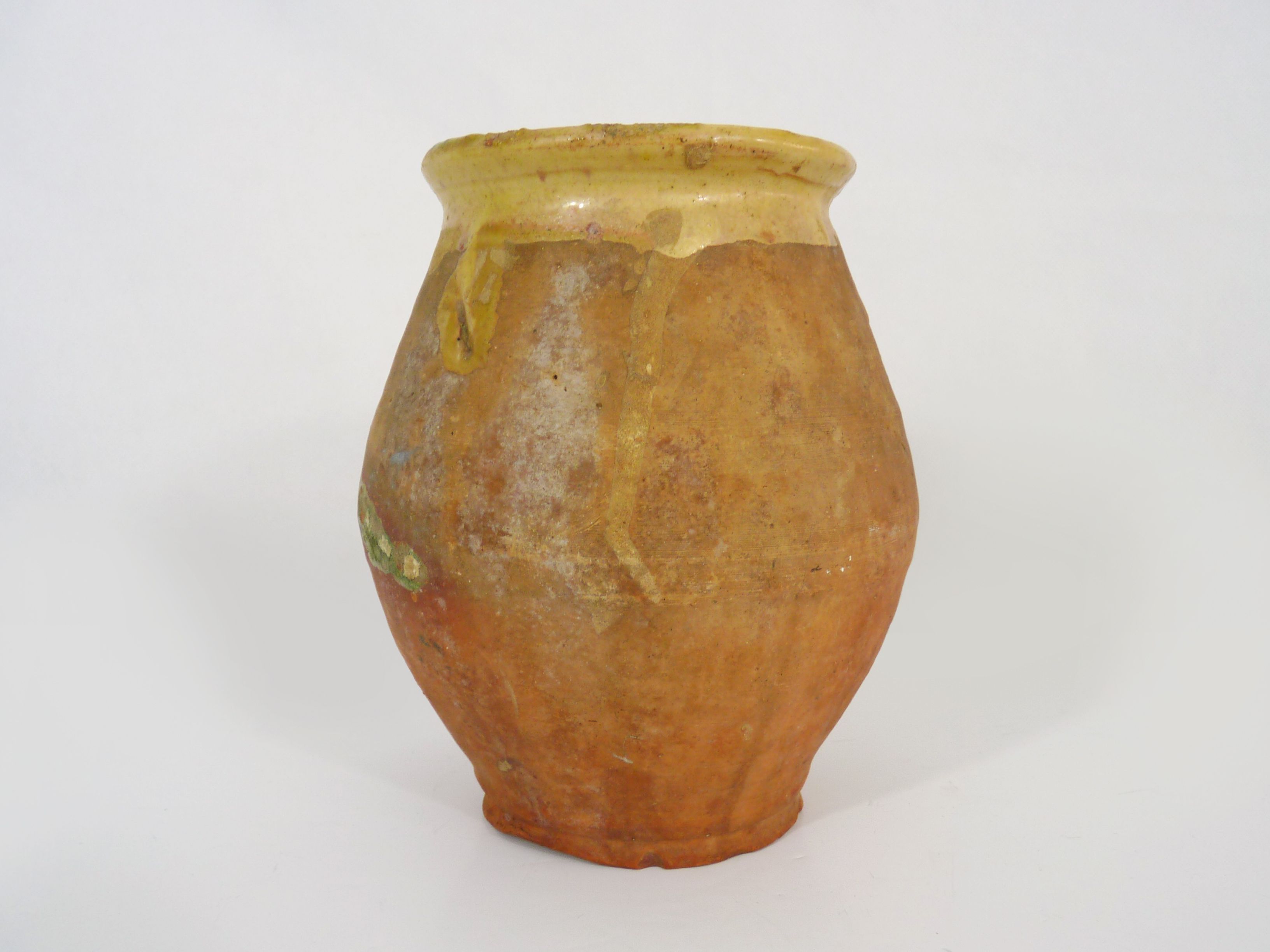 Beautiful little grease pot in yellow terracotta and glazed green. NINETEENTH century