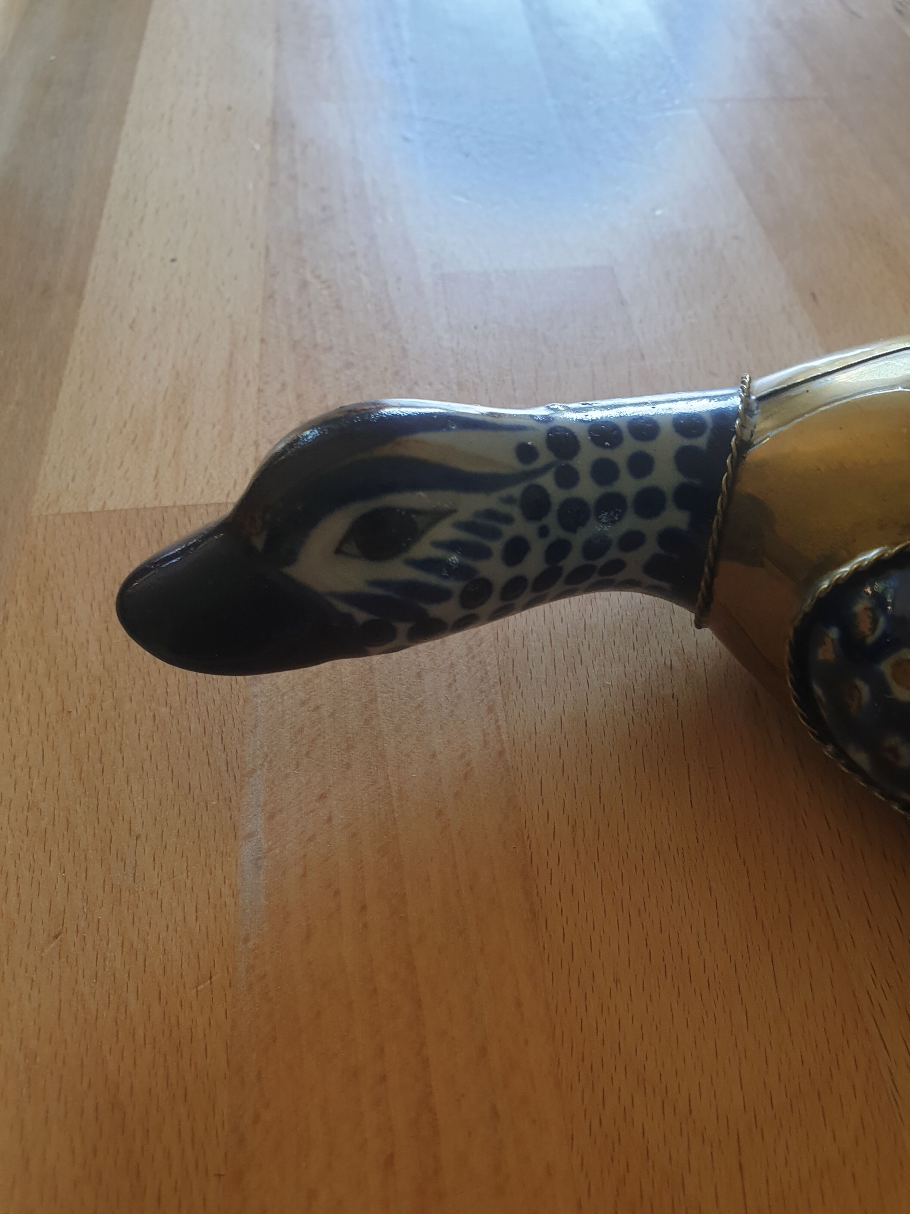 Brass duck and ceramics