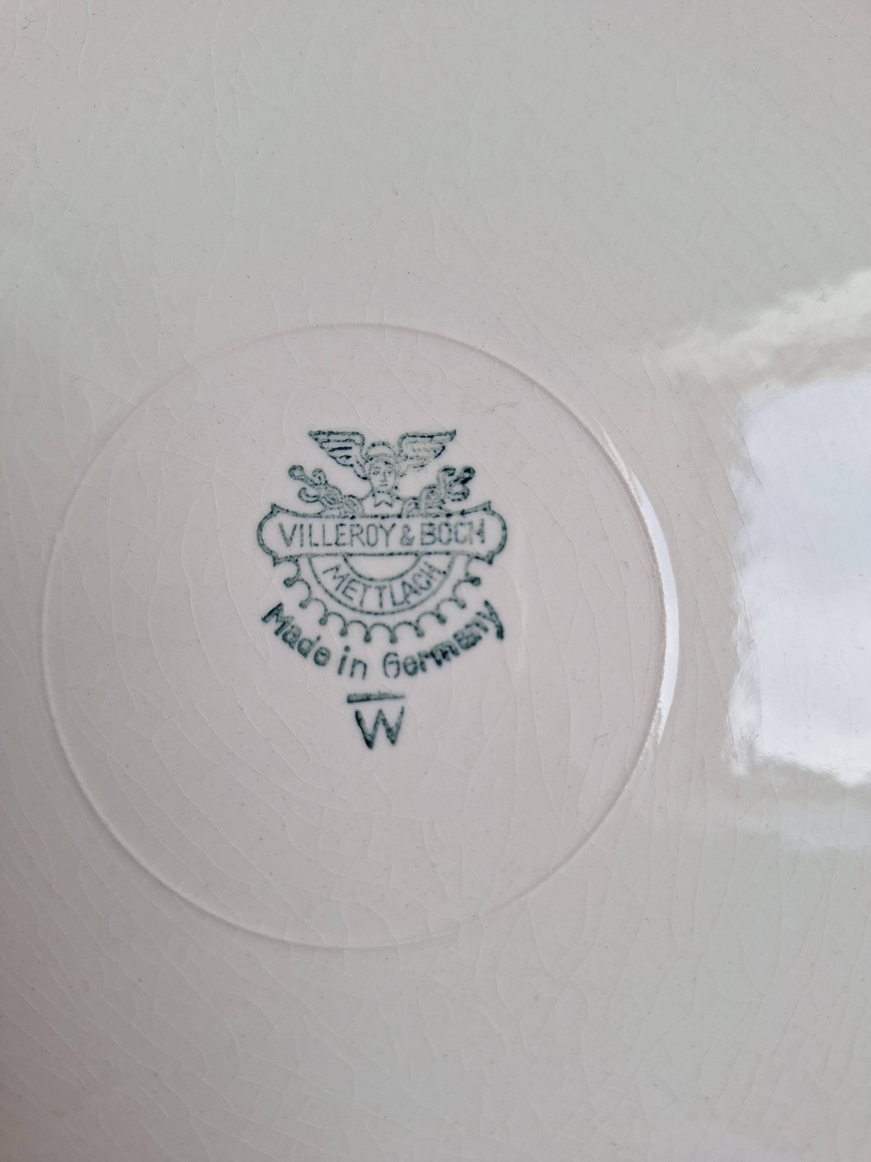 Villeroy & Boch peach-coloured dinner plates